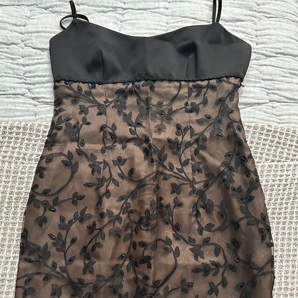 Dress with sheer overlay and beading